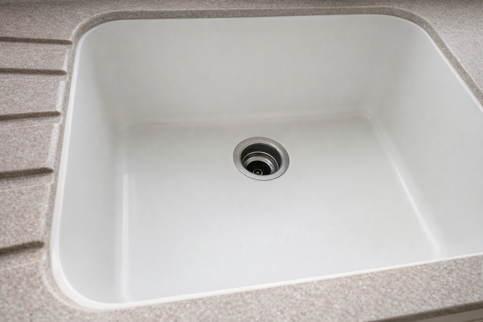 Corian solid surface kitchen sink repair and restoration