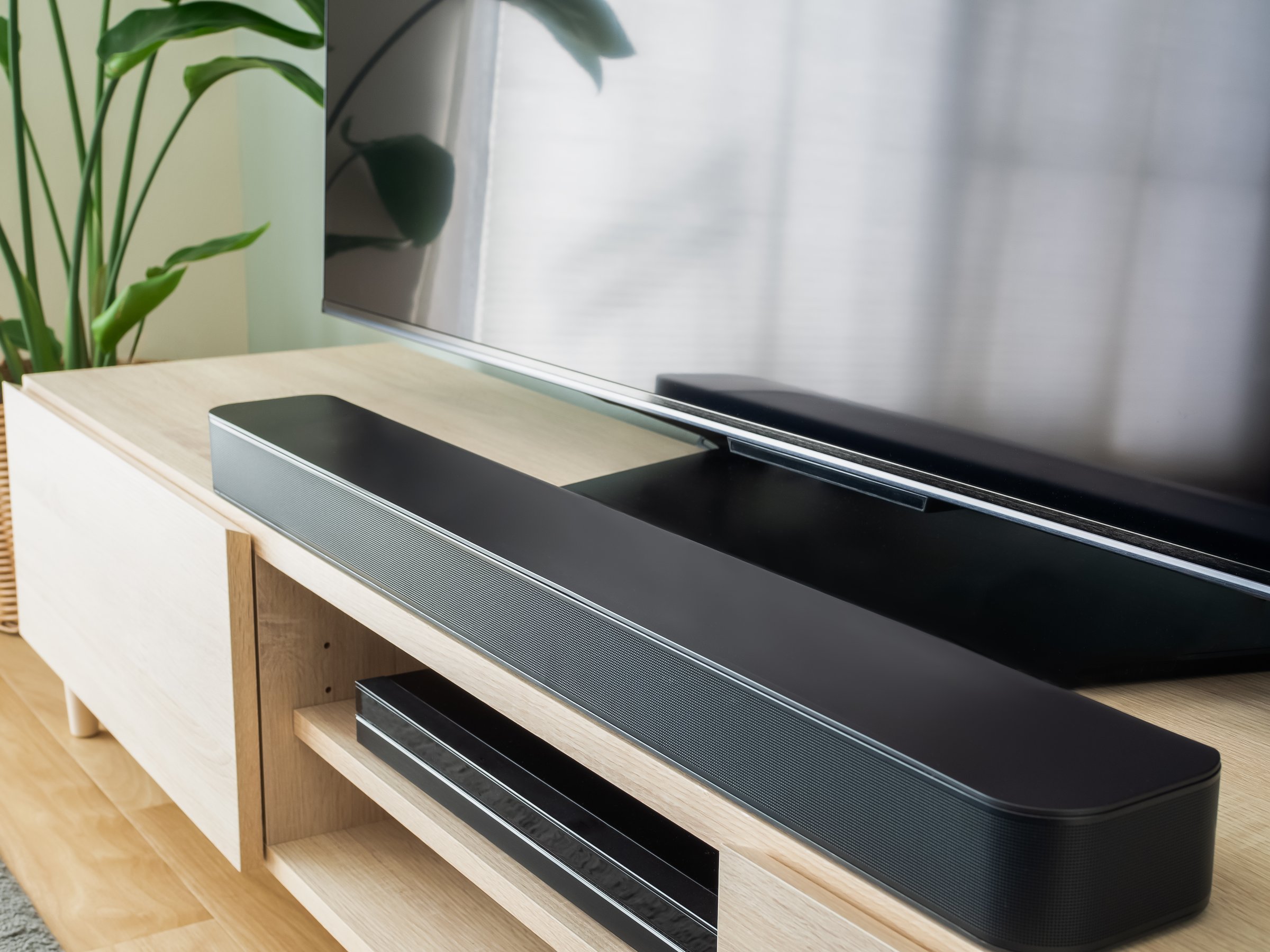 Soundbar in front of television