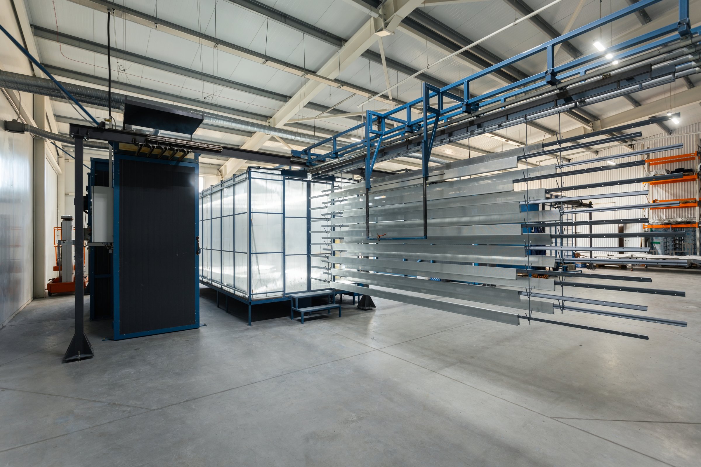 metal painting shop, parts ready for painting, perforated metal profiles