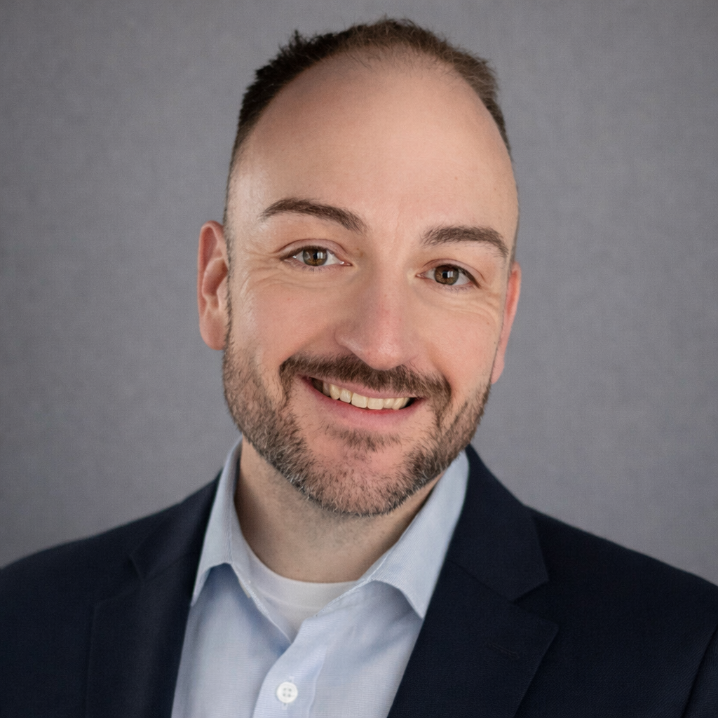 Professional headshot of Tyler Brewer, Legal Document Assistant