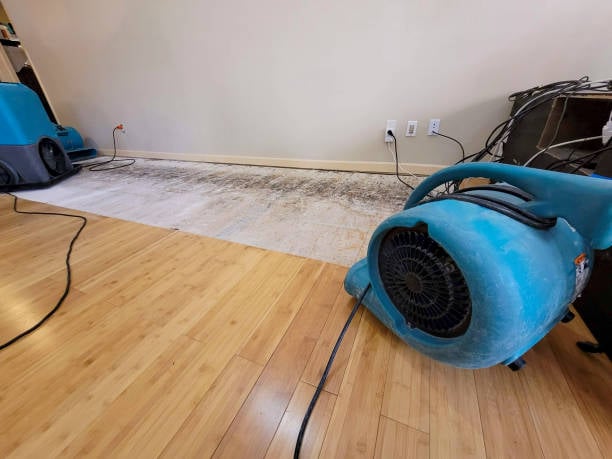 Water damage restoration equipment in room