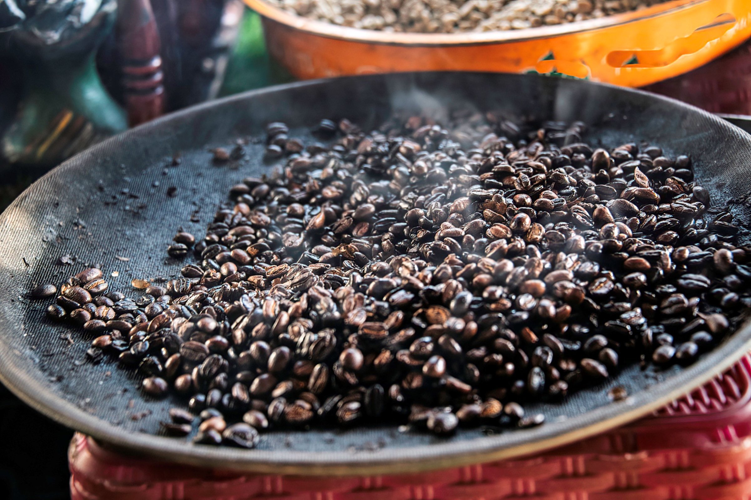 Roasting fresh coffee beans at a street coffee shop in Addis Ababa