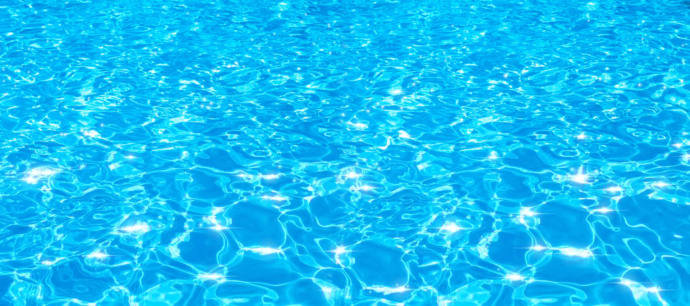 A brilliant and transparent background of the water surface