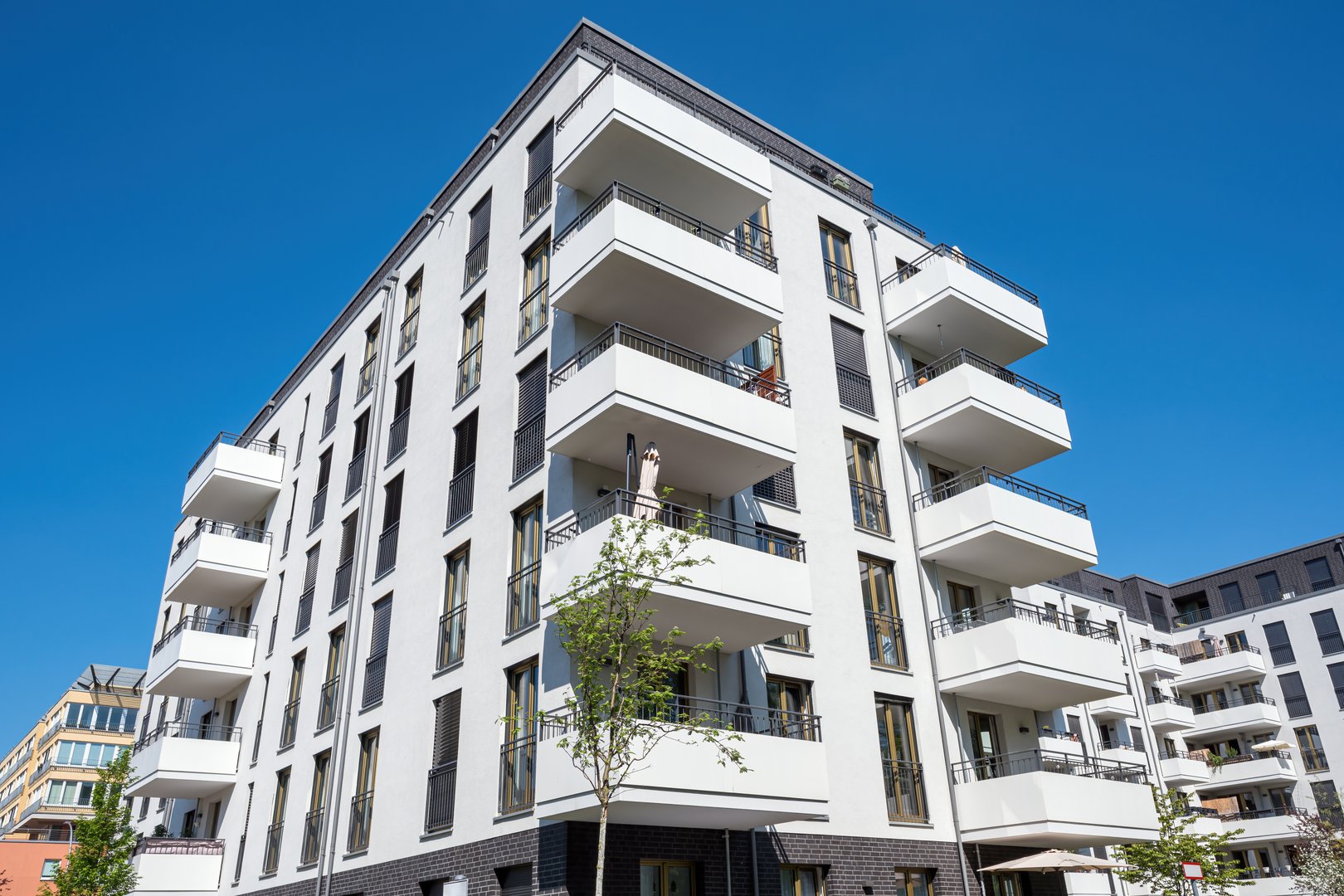 White multi-family residential building