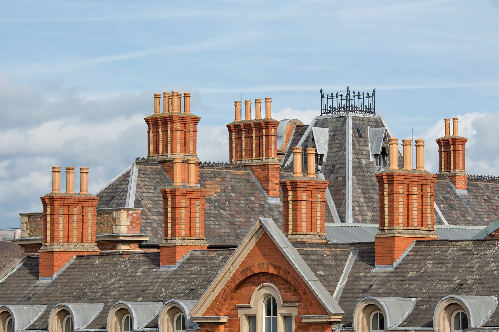 Chimneys and Chimney pots of the rood of the old Victorian, London Road Railways Station. Now used as a gym.