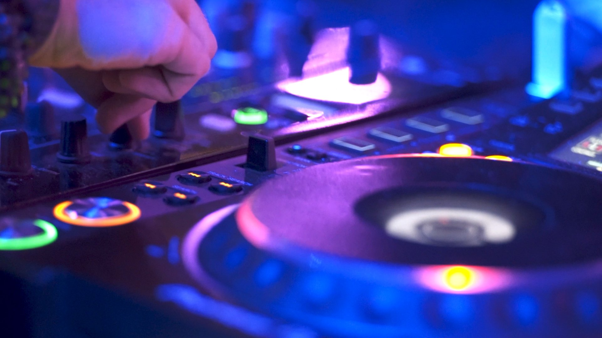 dj mixing on the disco console