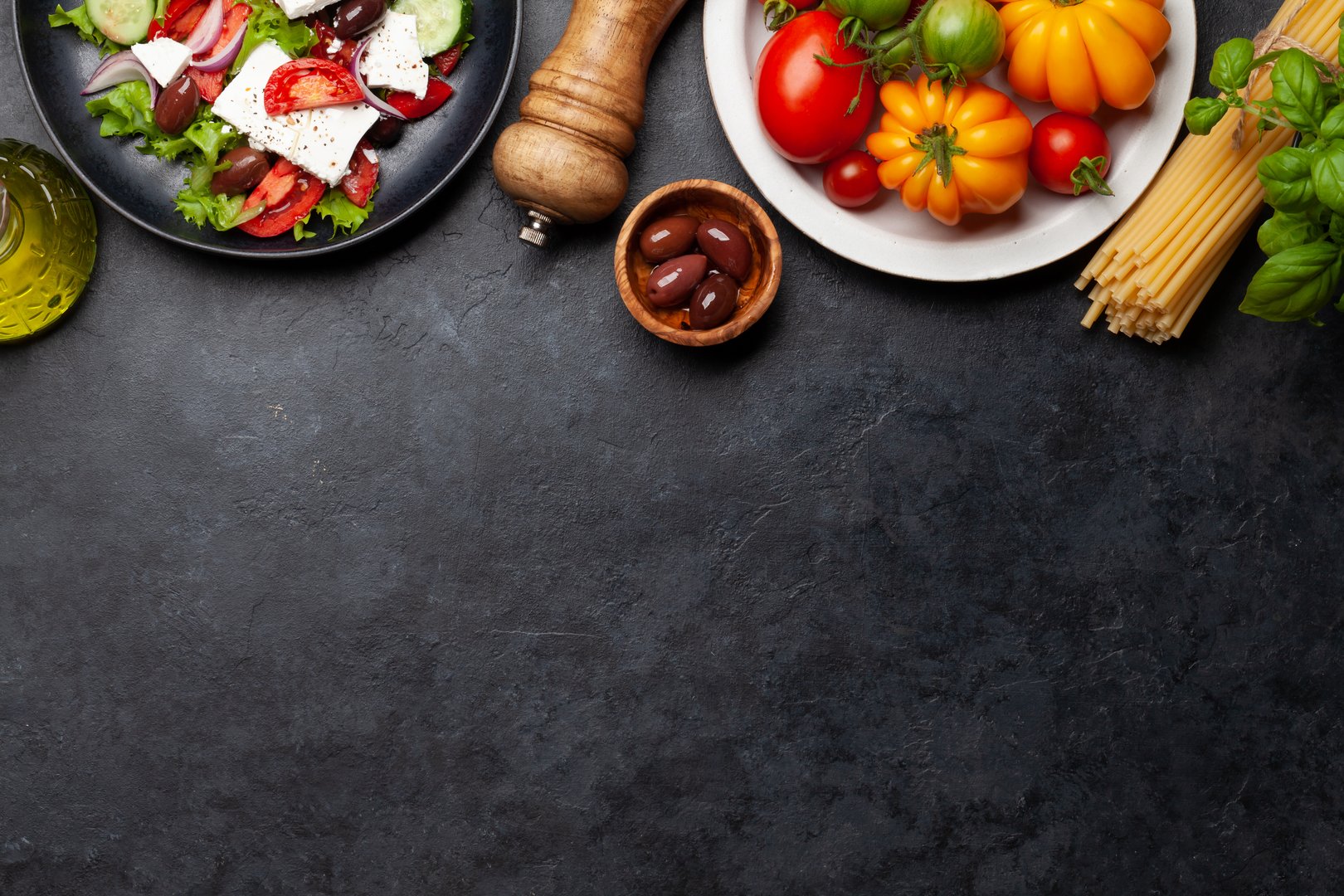 Greek salad with fresh vegetables and feta cheese. Flat lay with copy space