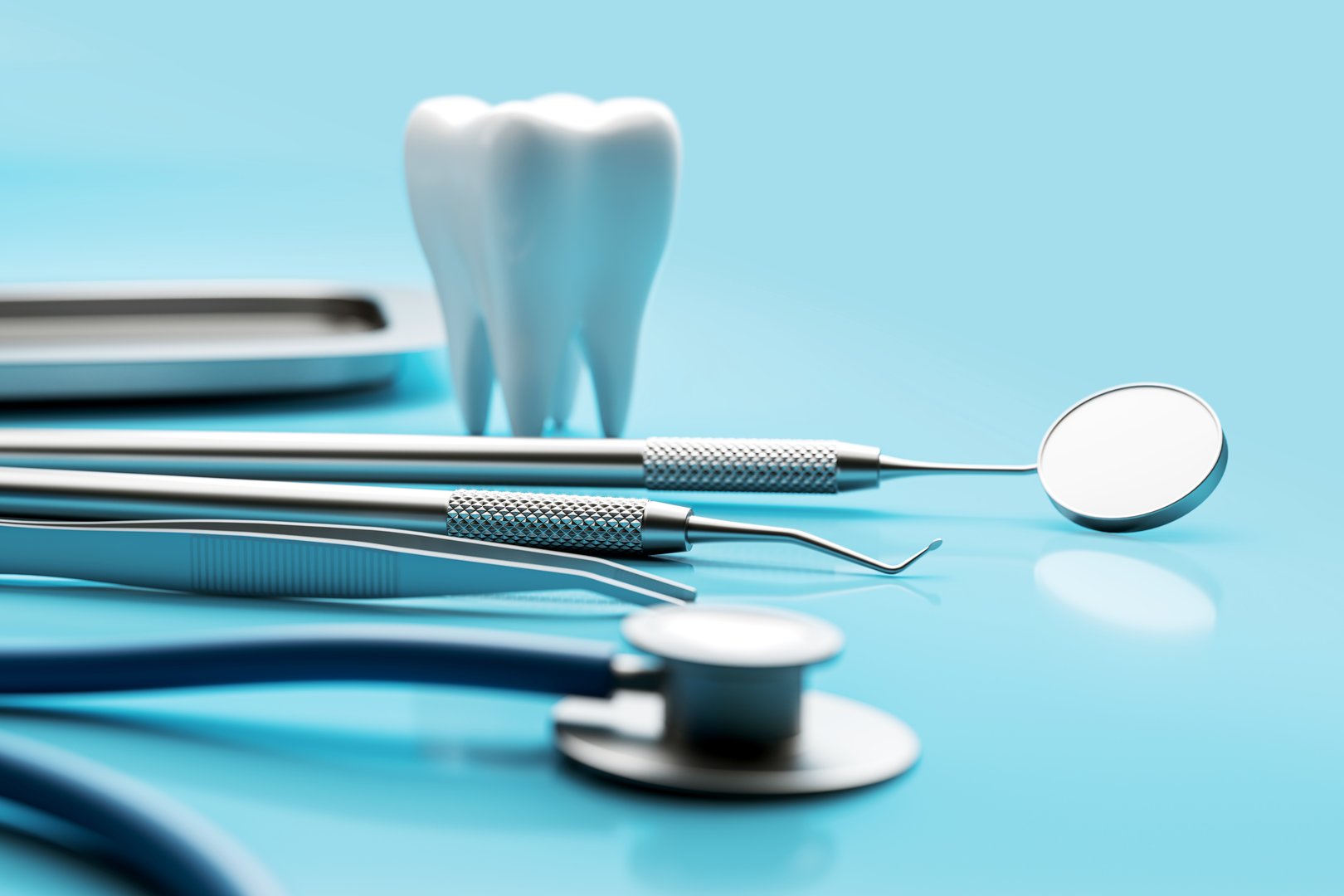 Dental instruments, stethoscope, and tooth model closeup on light blue gradient background. Medical tools and accessories concept. 3D Rendering