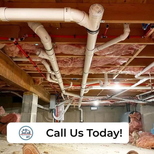 Professional insulation installation underneath floor joists