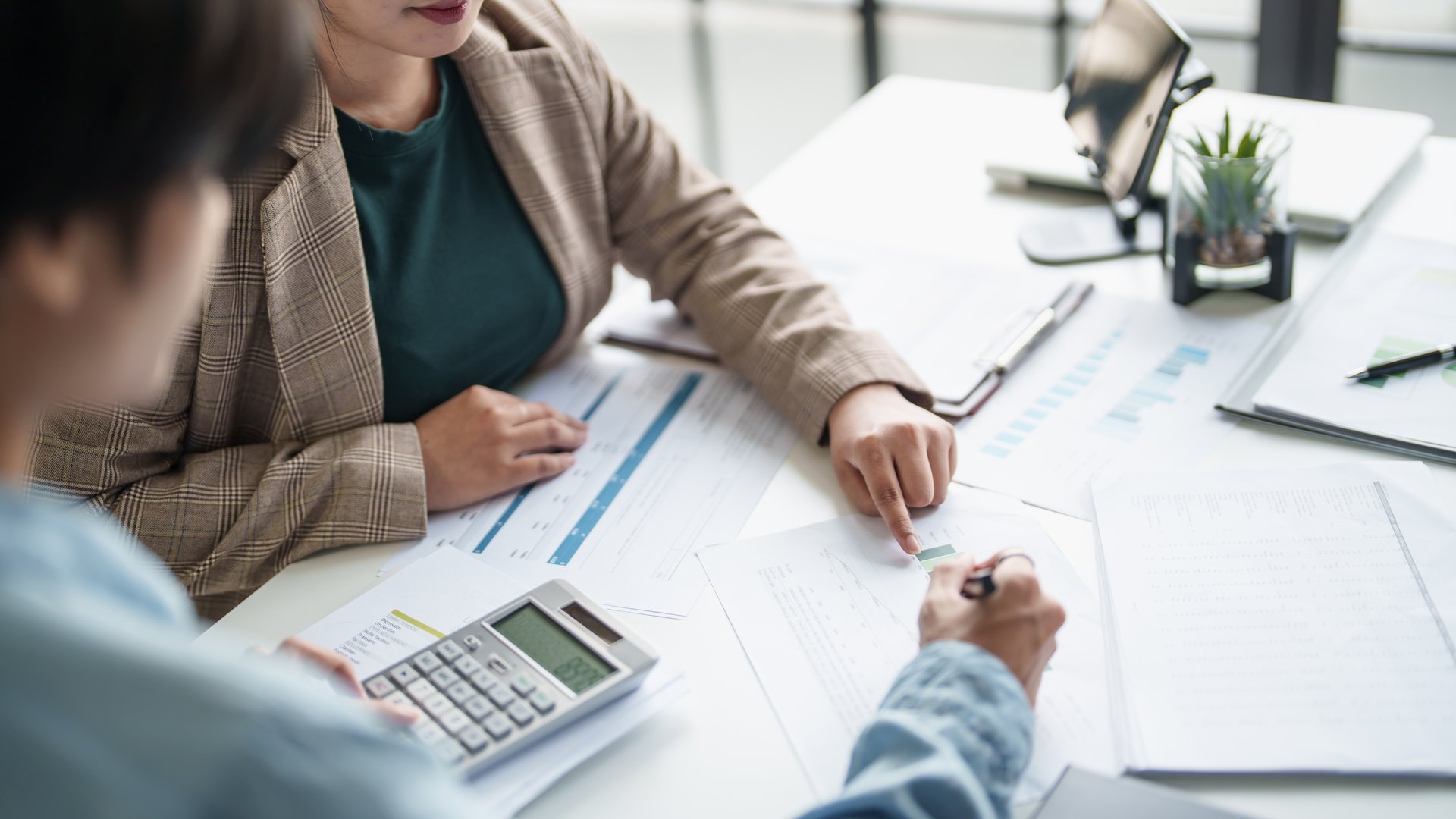 business man Auditor or internal revenue service staff checking annual financial statements company Audit Â Accounting tax