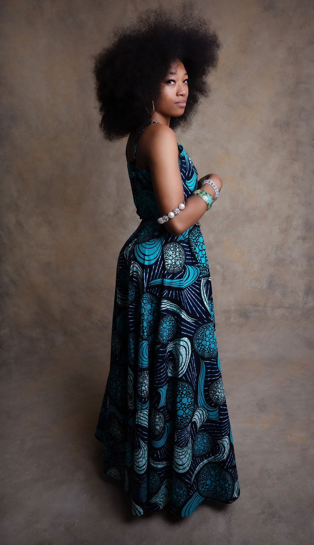 Elegant African-inspired fashion piece showcasing vibrant Ankara fabrics and contemporary design