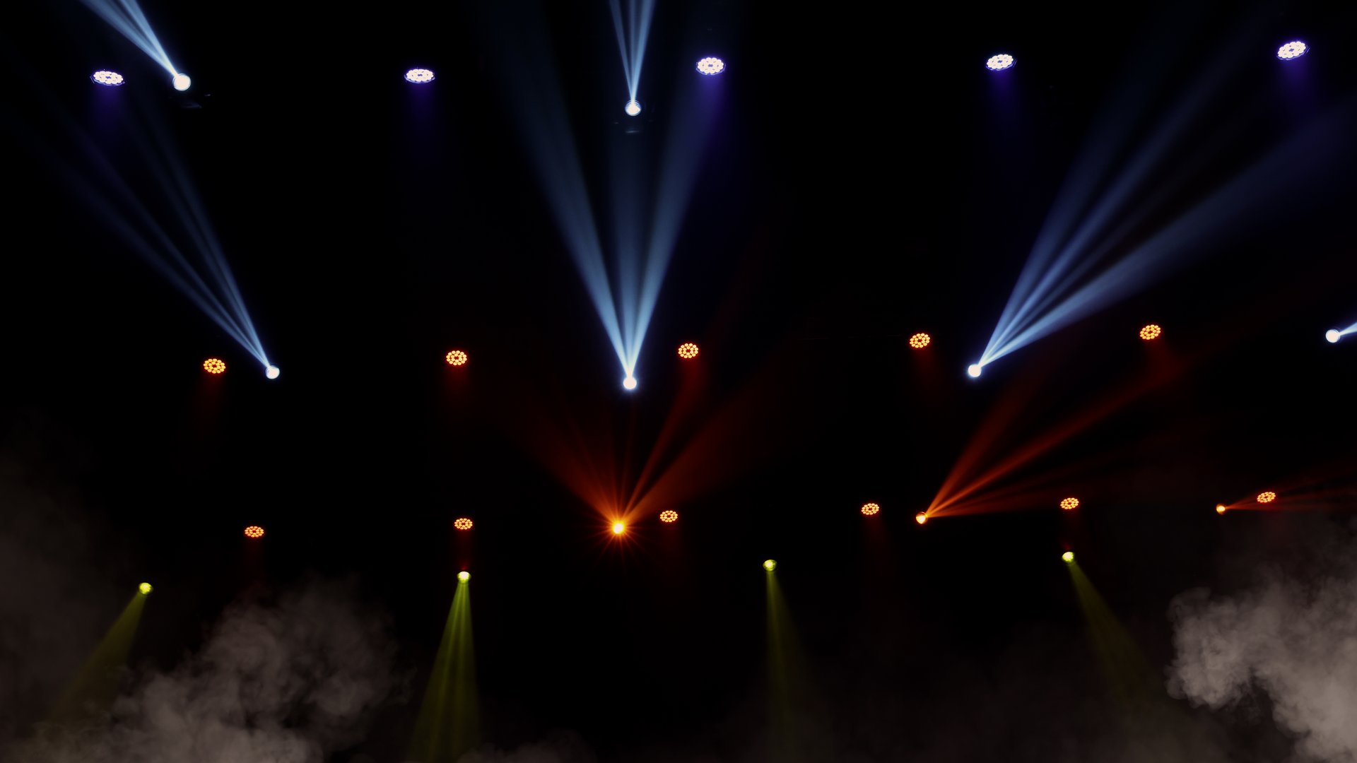 Stage lights background. Light beams and smoke from the stage spotlights on the stage at time of show. Laser show isolated on black background. Empty stage with light projector illumination backdrop.