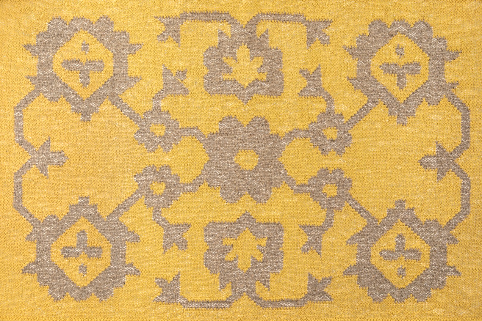 Yellow textile with abstract ethnic pattern. Boho style folk fabric, rug pattern.