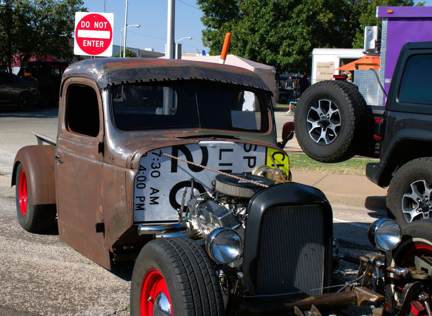 Rat rod car at event