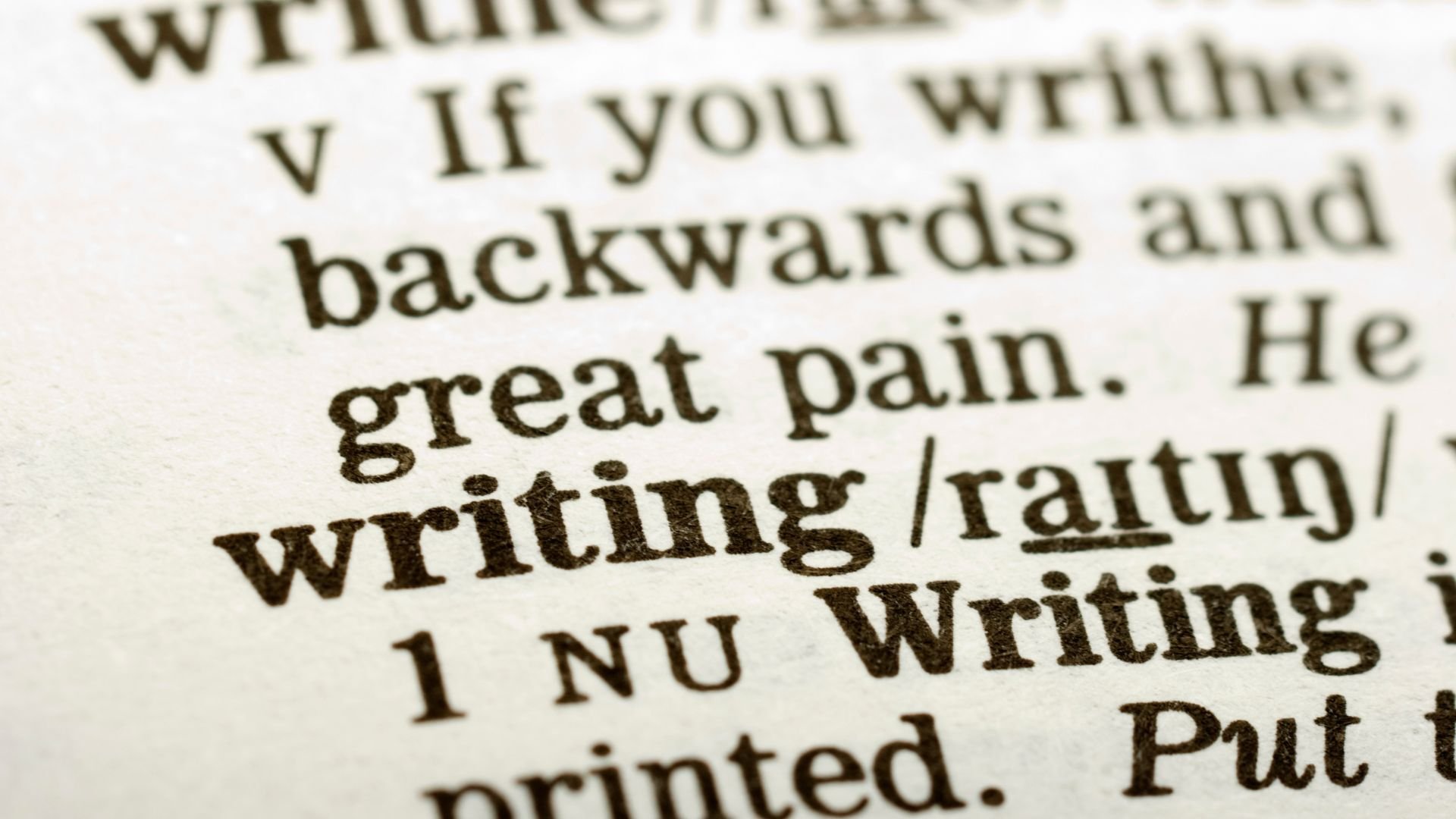 Close-up of printed text with writing underlined, emphasizing the power of pen to paper