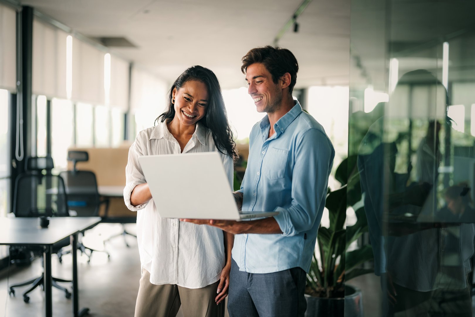 Executive team discussing in corporate office