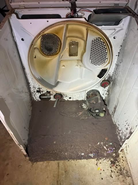 Recently cleaned dryer vent showing dangerous lint buildup