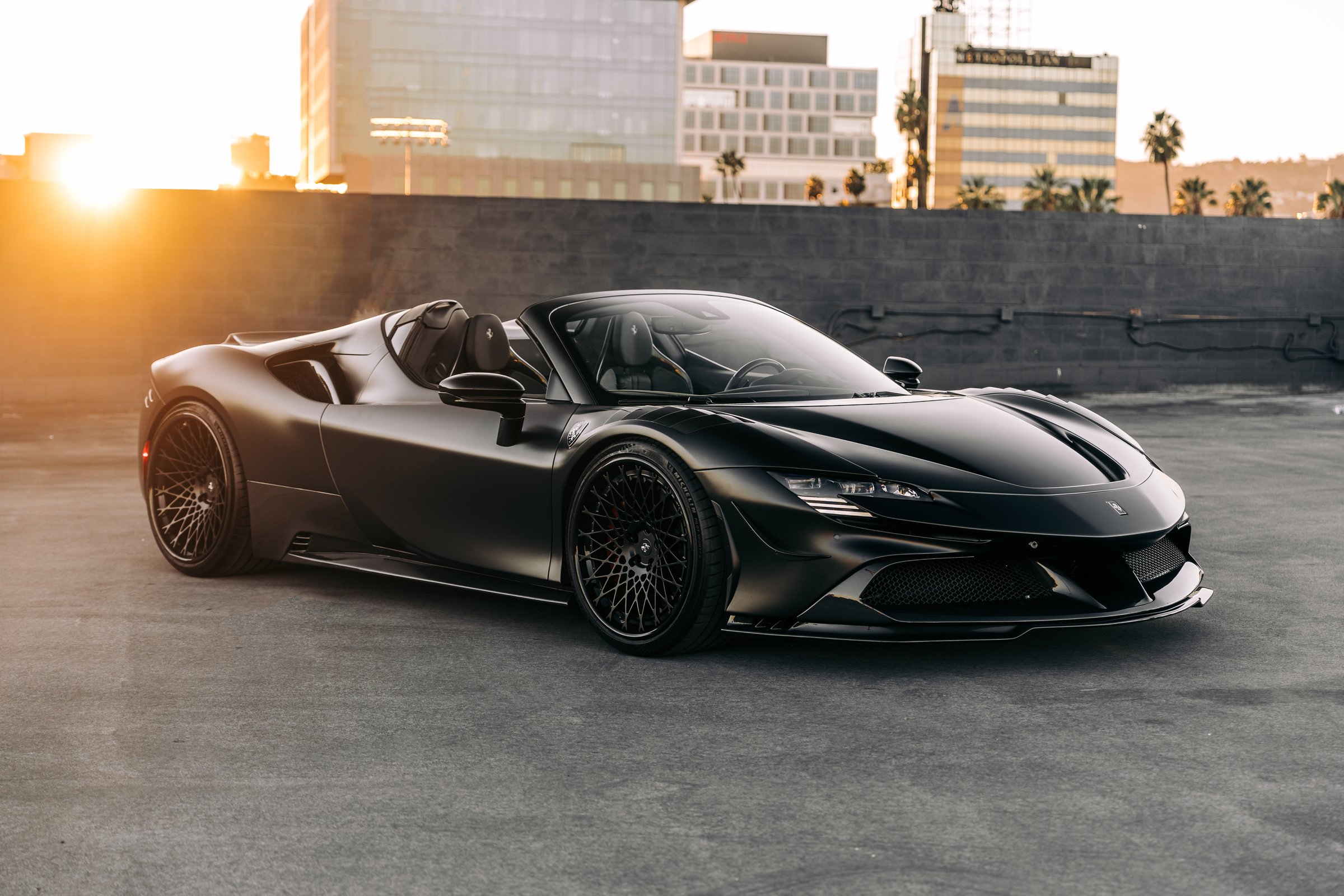 LA, CA, USA
March 31, 2025
Ferrari SF90 Spider parked outside showing the front of the car