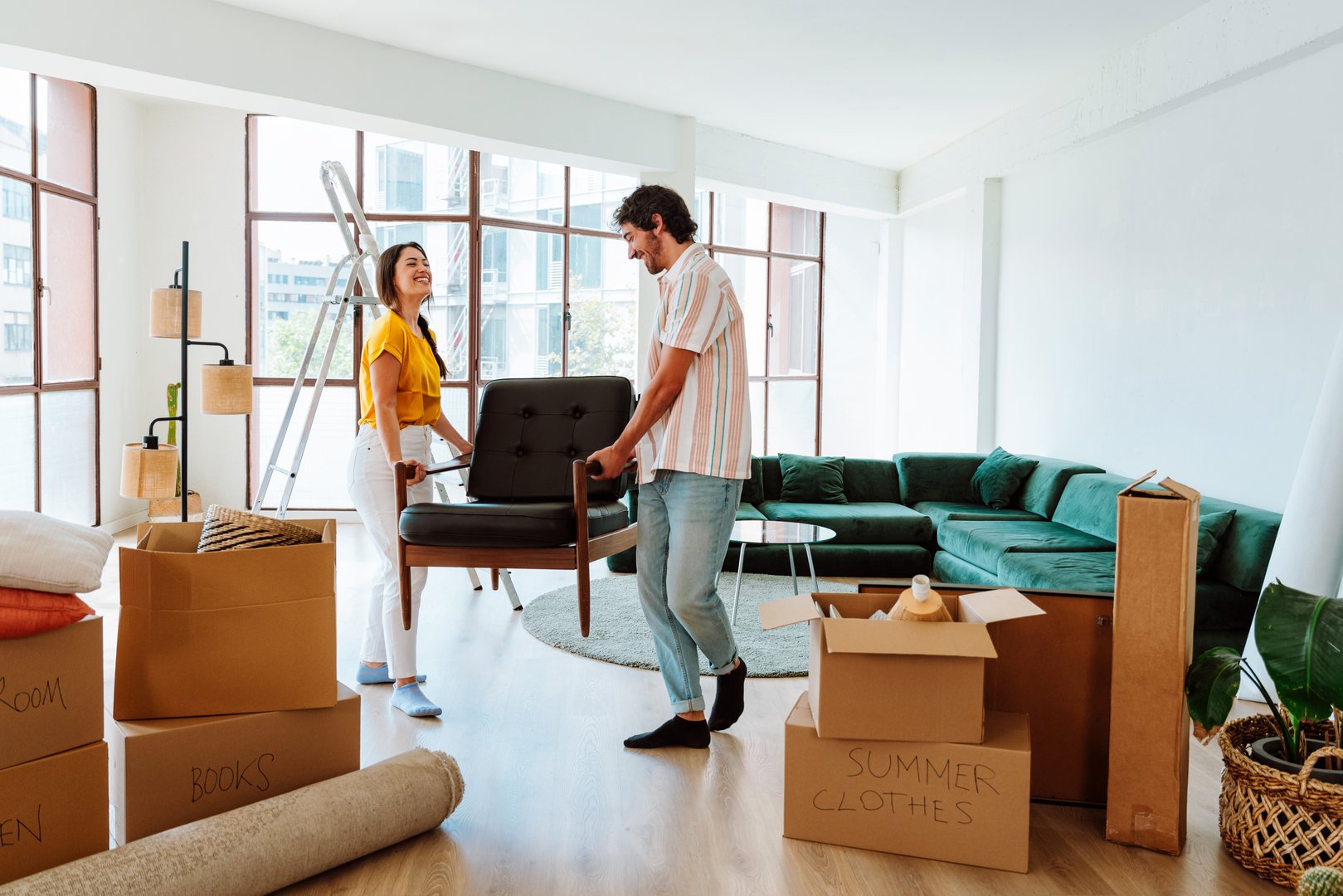 Happy couple in their new home