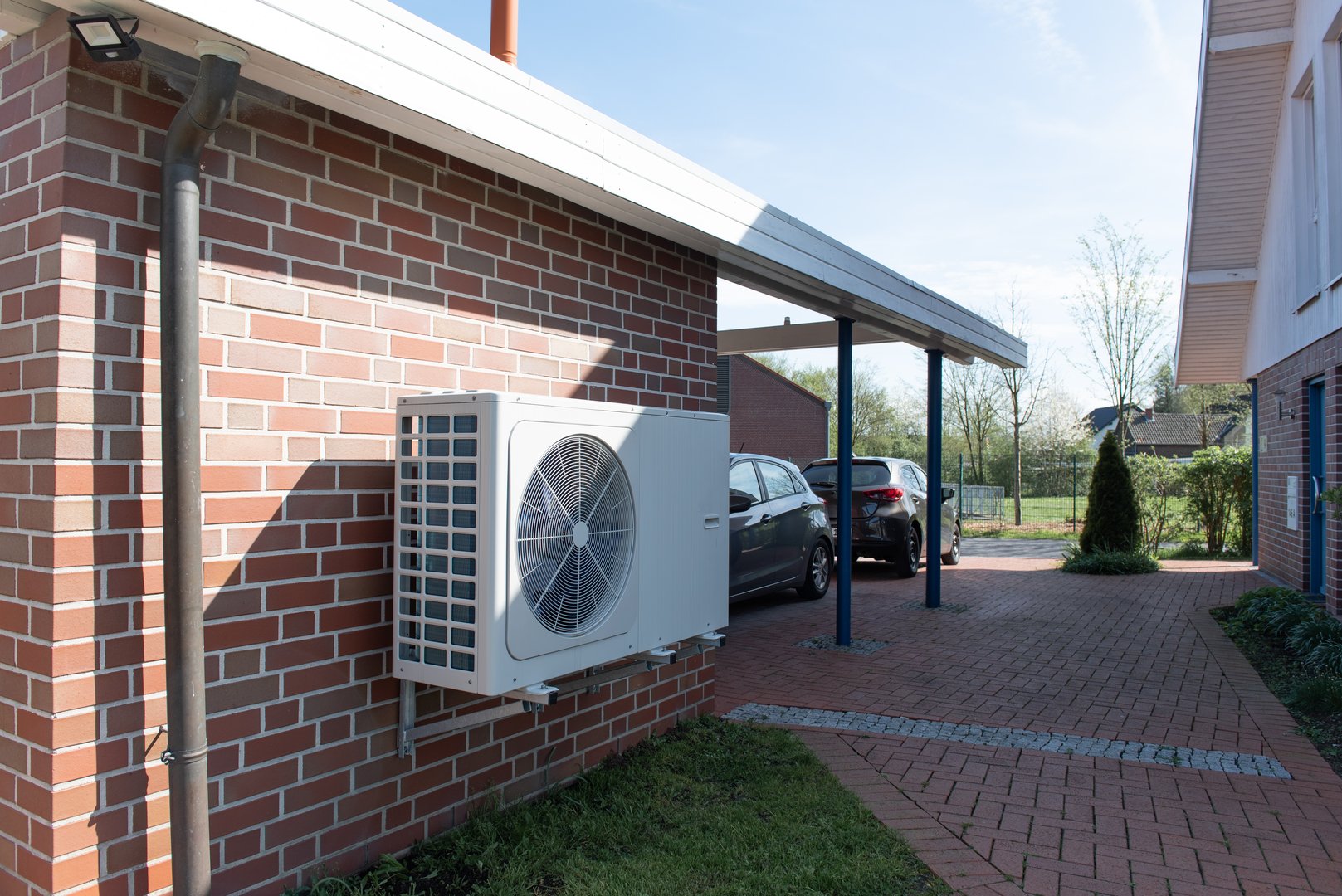 Air Source heat pump fitted outside a new home development