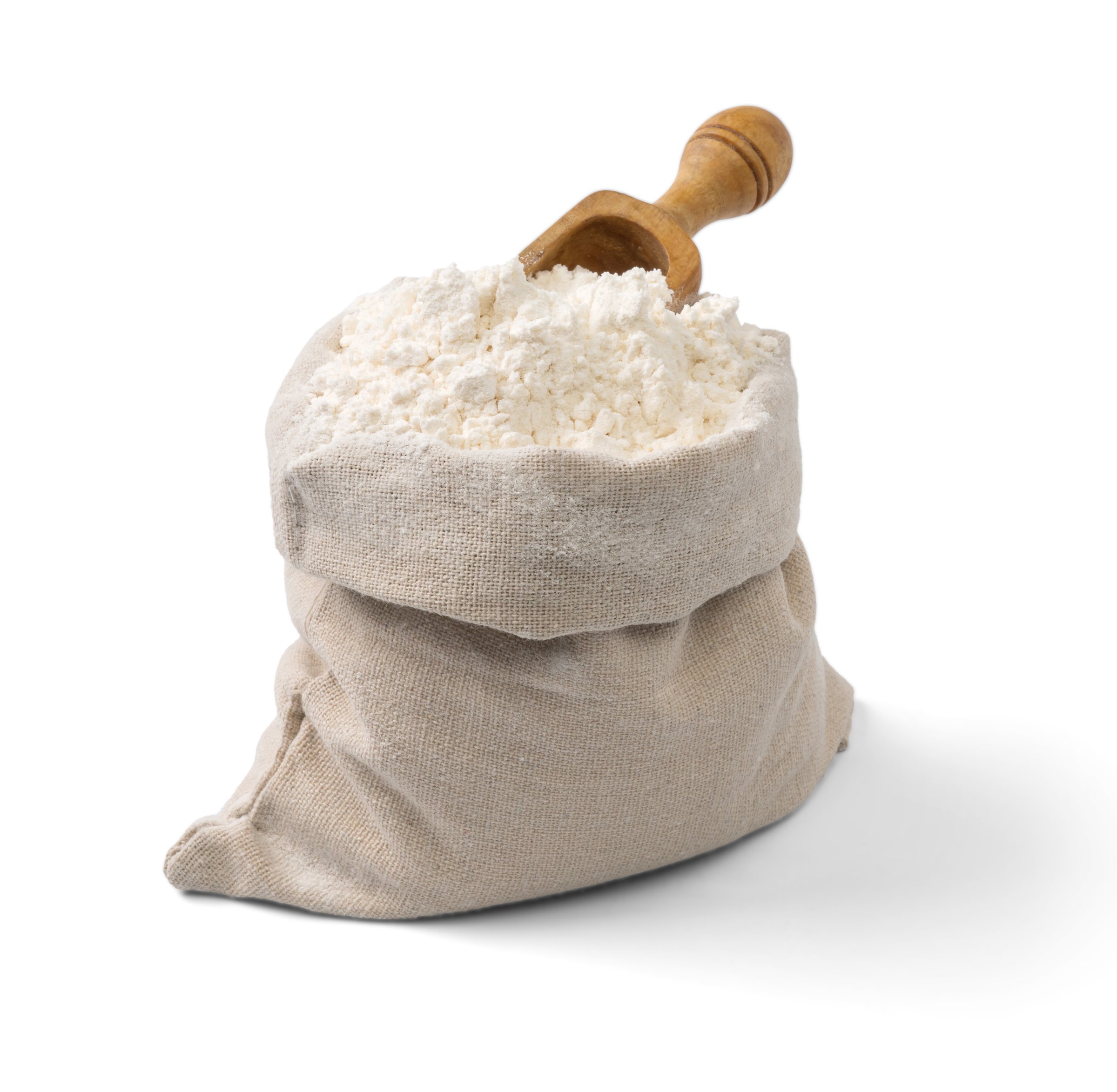 Bag with flour and wooden scoop isolated.