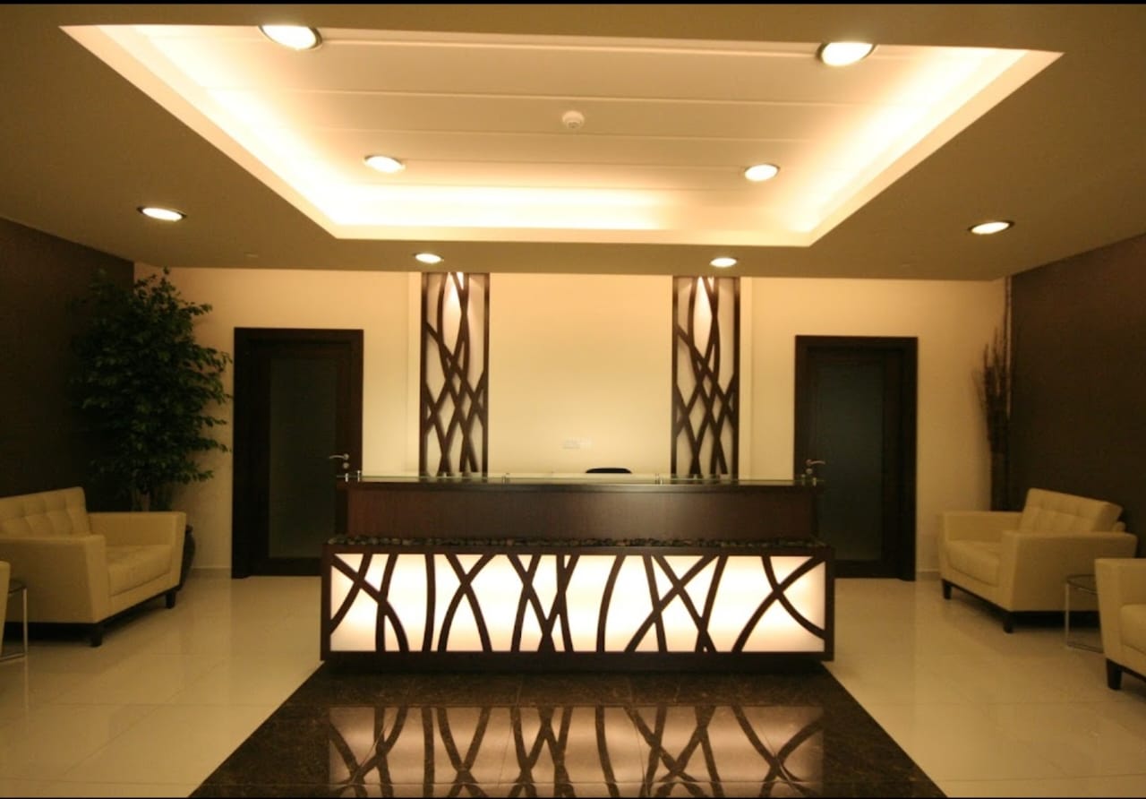 Doctor and nurse walking through hospital hallway