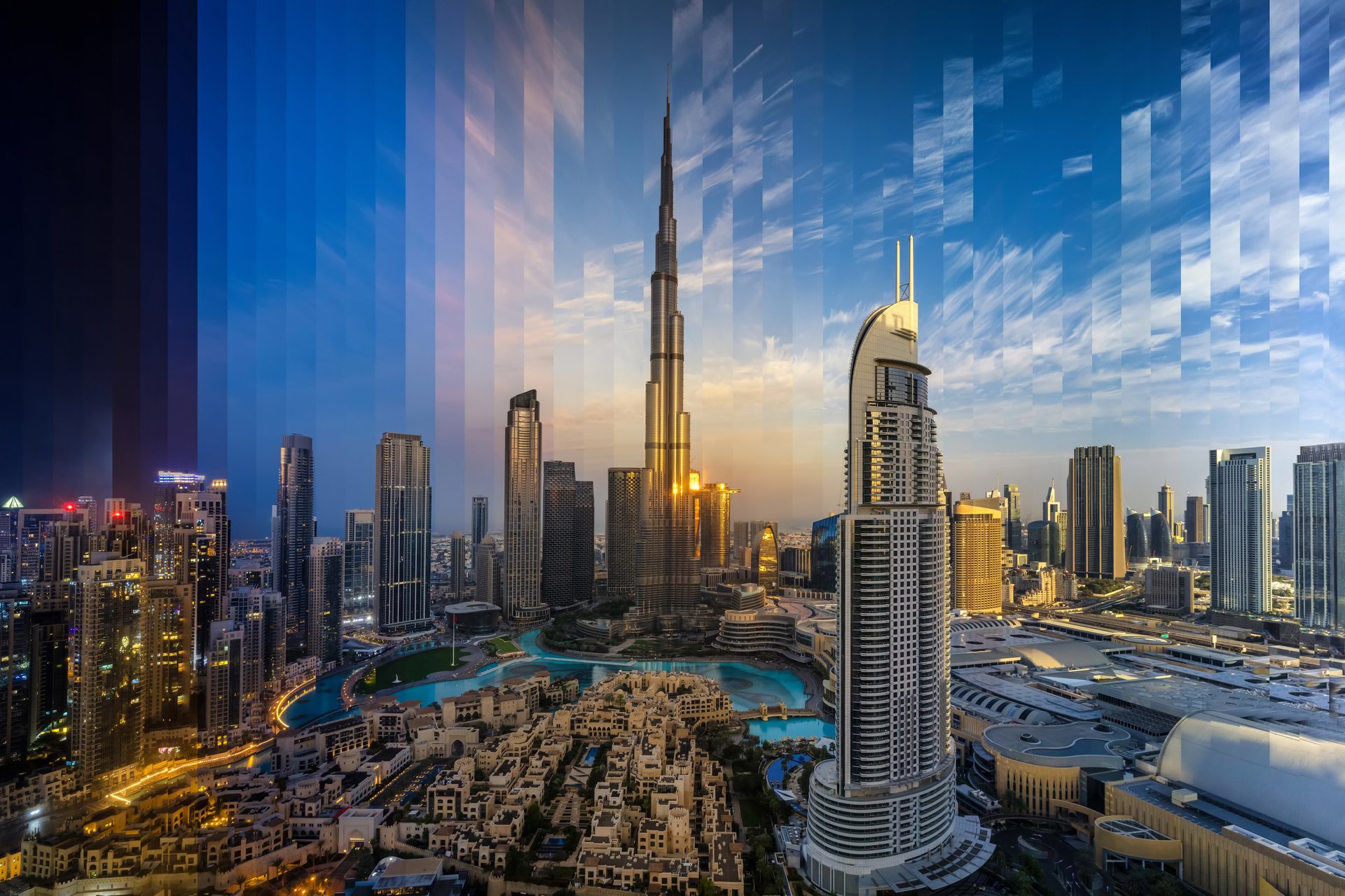 Night to day sunrise sliced time lapse view of the modern Downtown City skyline of Dubai, UAE