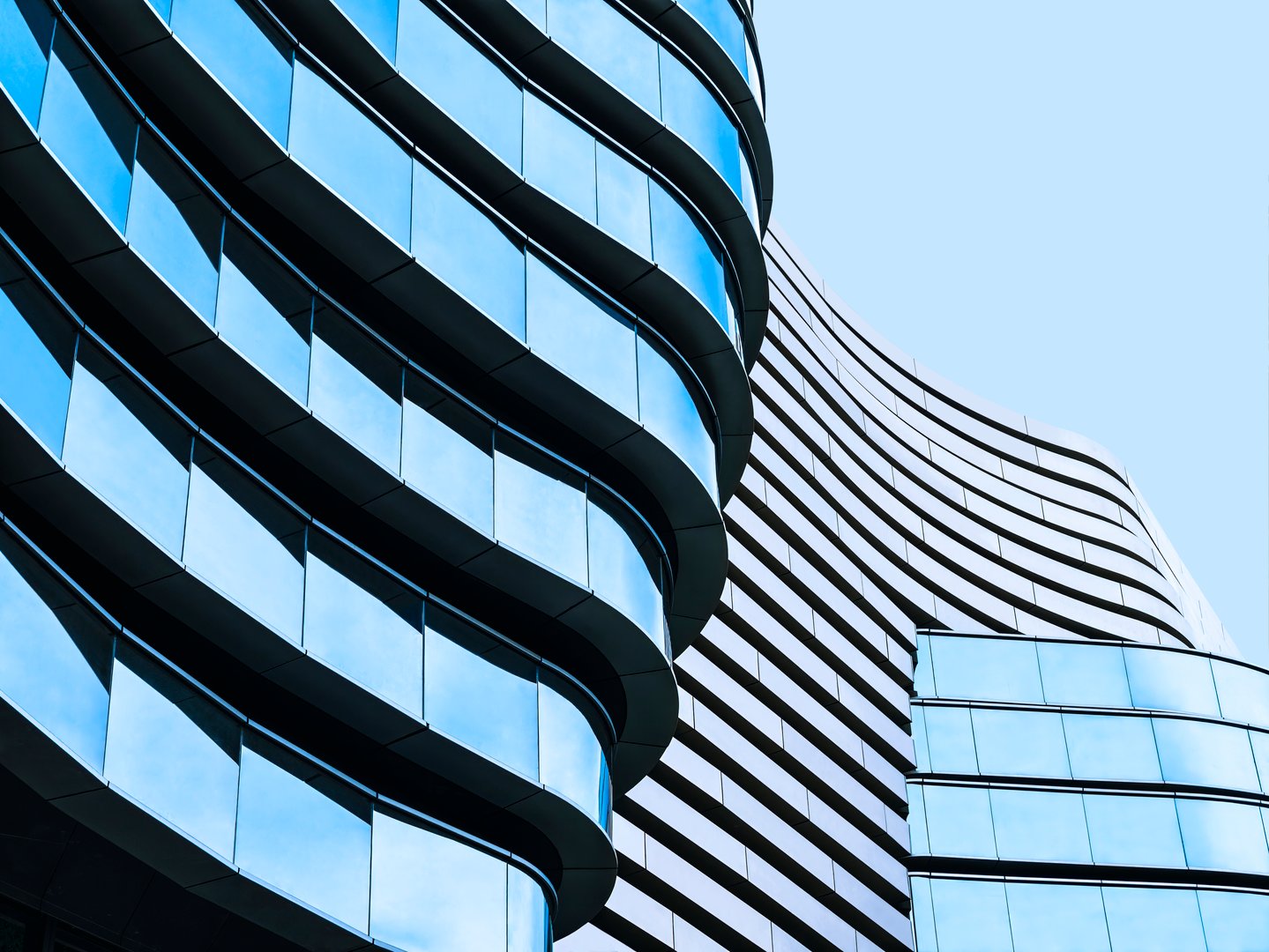 Glass wall curve Architecture details Modern building Exterior Futuristic Cityscape