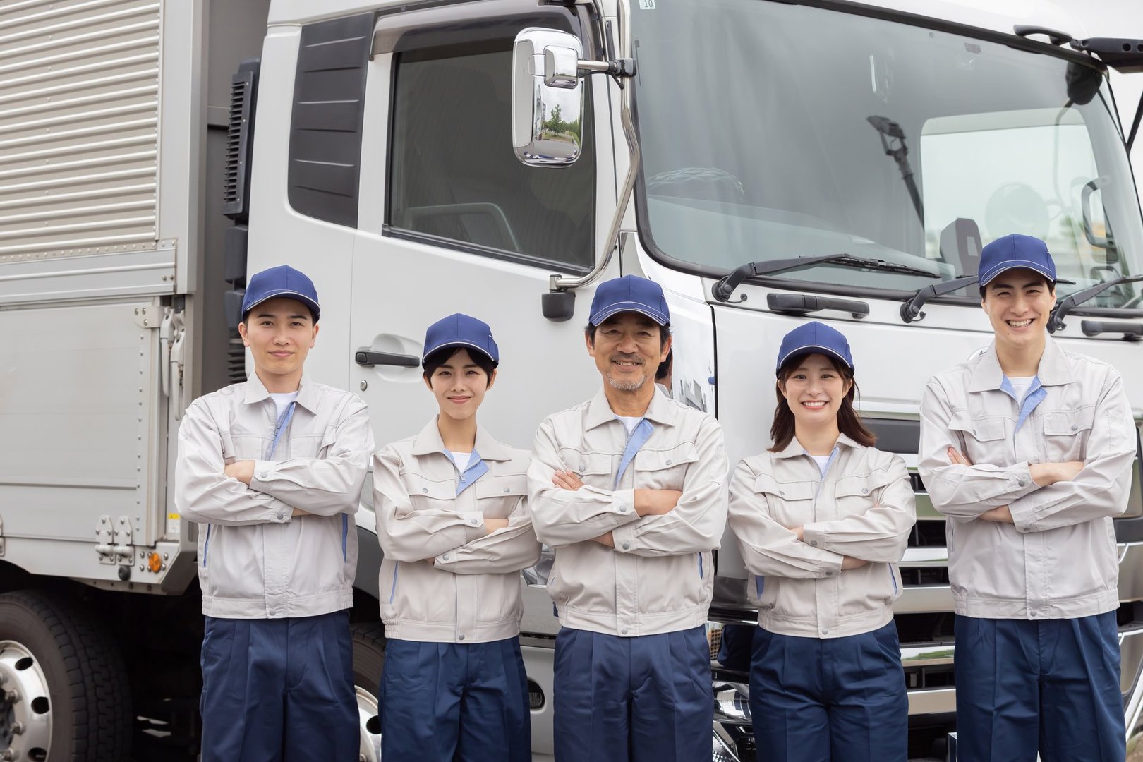 Group of Asian people working in a transportation company