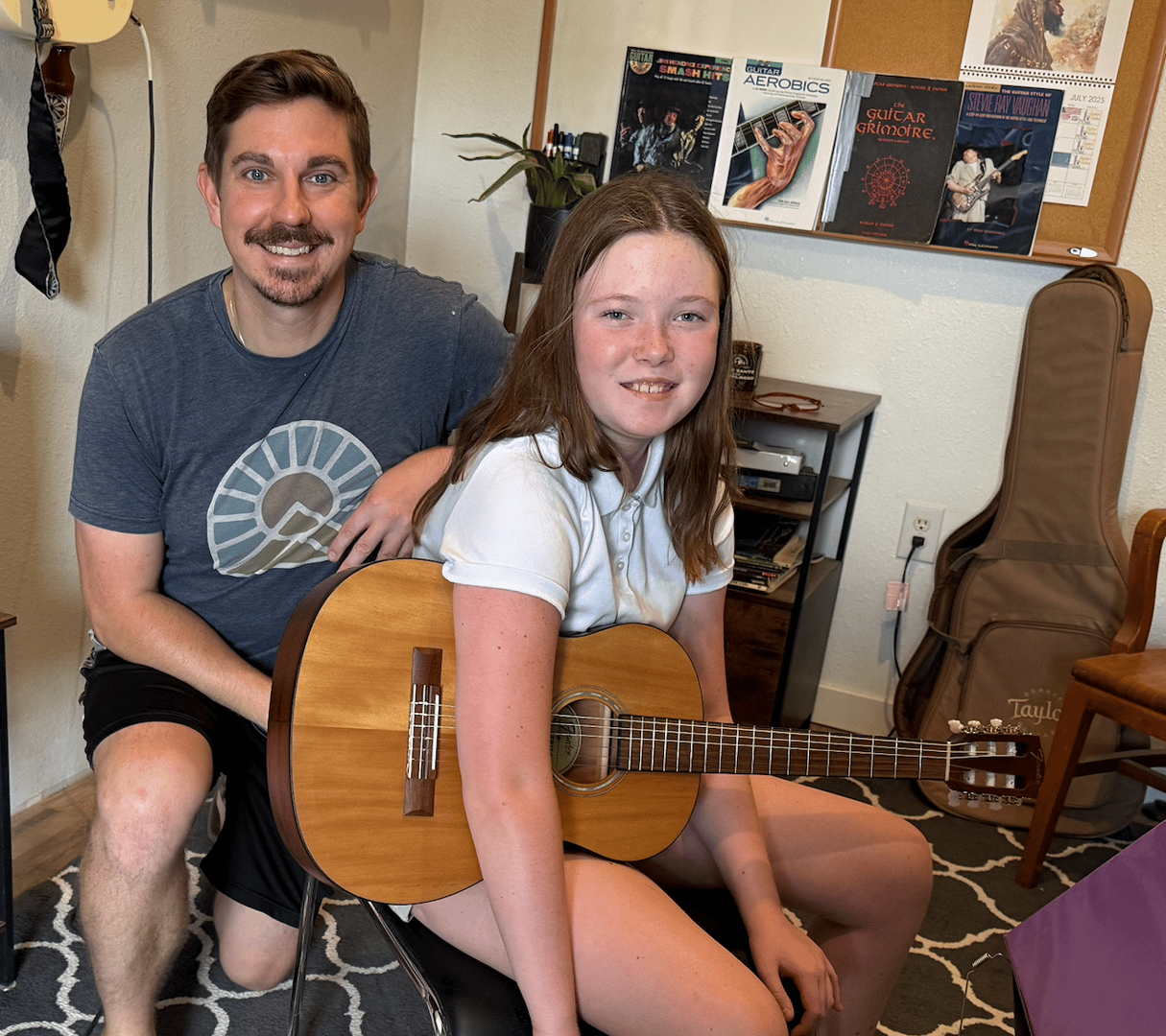 Teaching guitar student