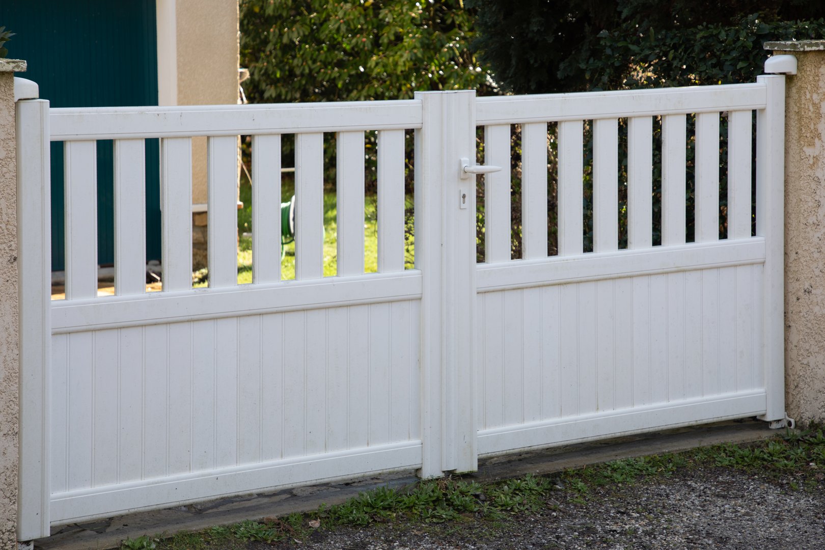 PVC double gates of modern house white home door plastic slats of car modern entrance