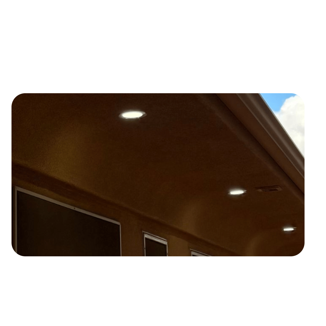 Electrician working on electrical panel in newly constructed home