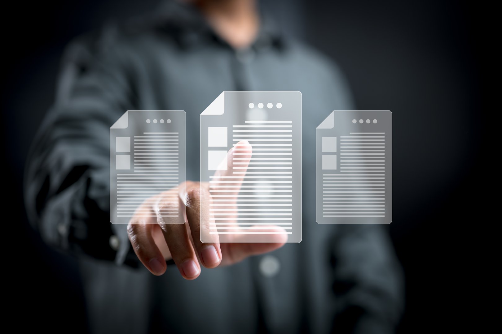 Hands typing on laptop with cloud computing