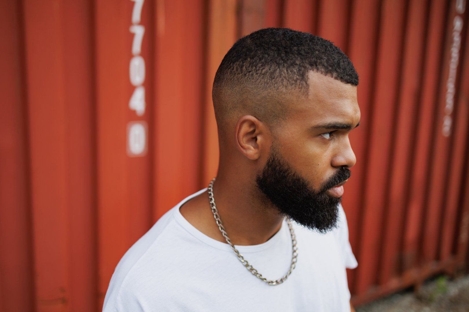 Stylish african american man looking away in cargo port