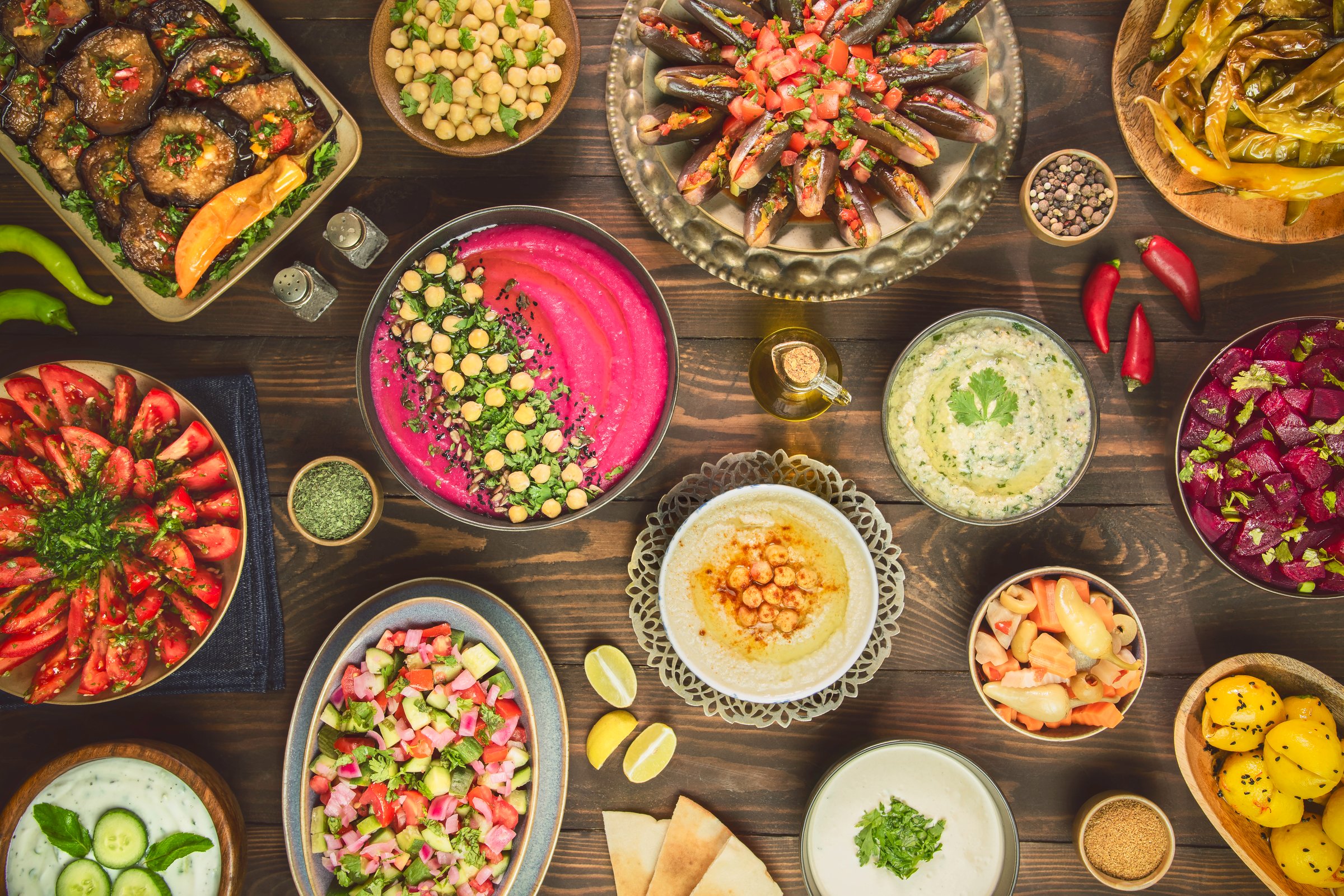 Arabic Cuisine; Middle Eastern traditional salad. Assorted of Egyptian oriental salad dishes. Top view with close up.