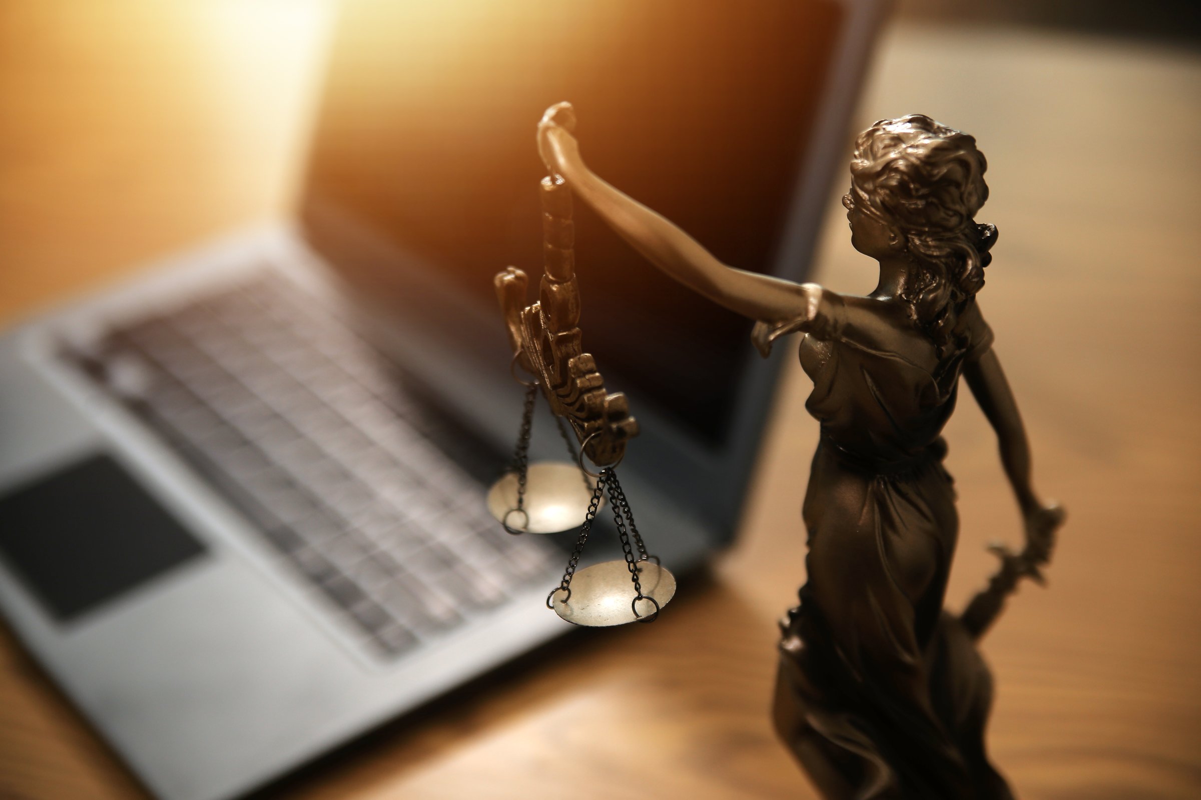 Judge gavel with Justice lawyers having team meeting at law firm background. Concepts of Law and Legal services.