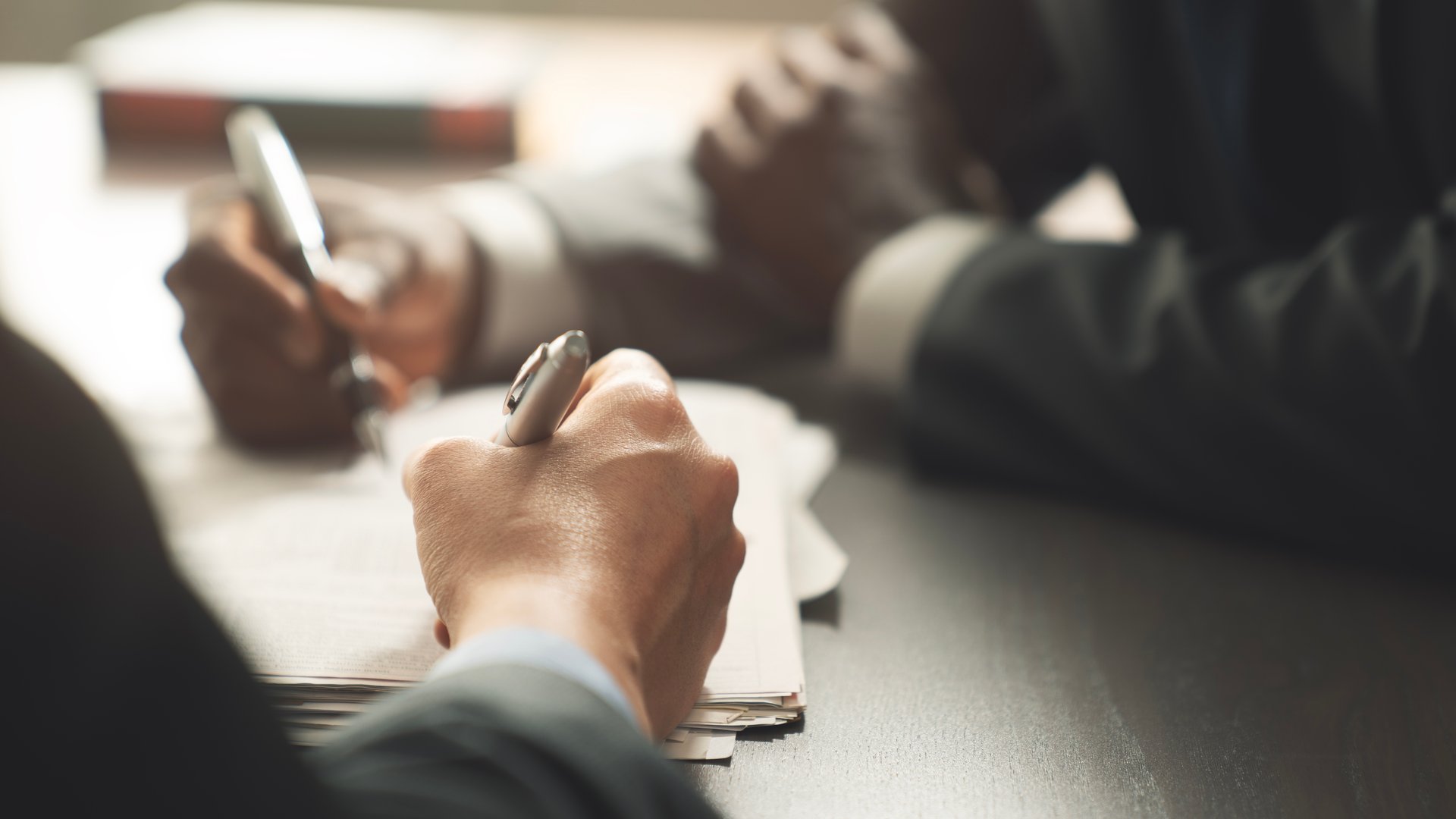 Working on the paperwork and signing the agreement