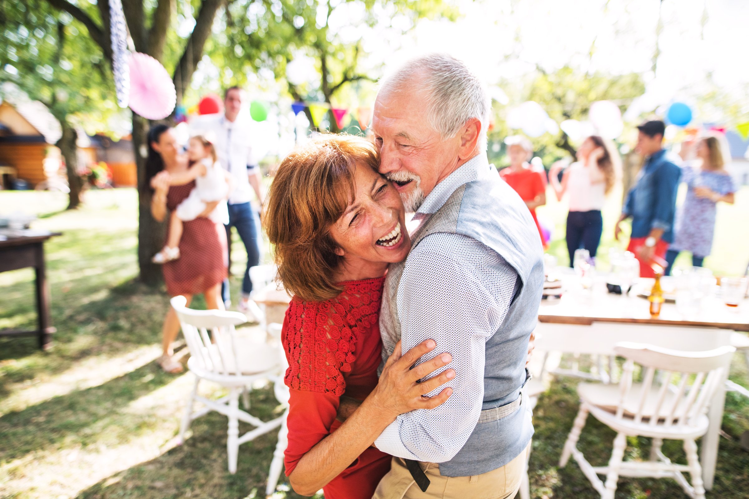 Elderly people enjoying a social event