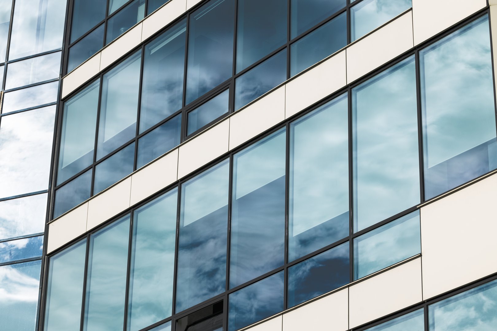 glass material skyscraper modern office external side facade building architecture textured perspective surface with dramatic colors cold tone