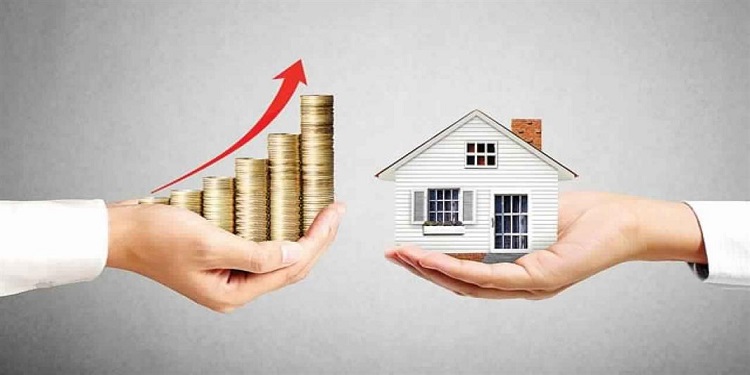 Hands holding stacked coins with a rising arrow and a model house, symbolizing real estate investment growth.