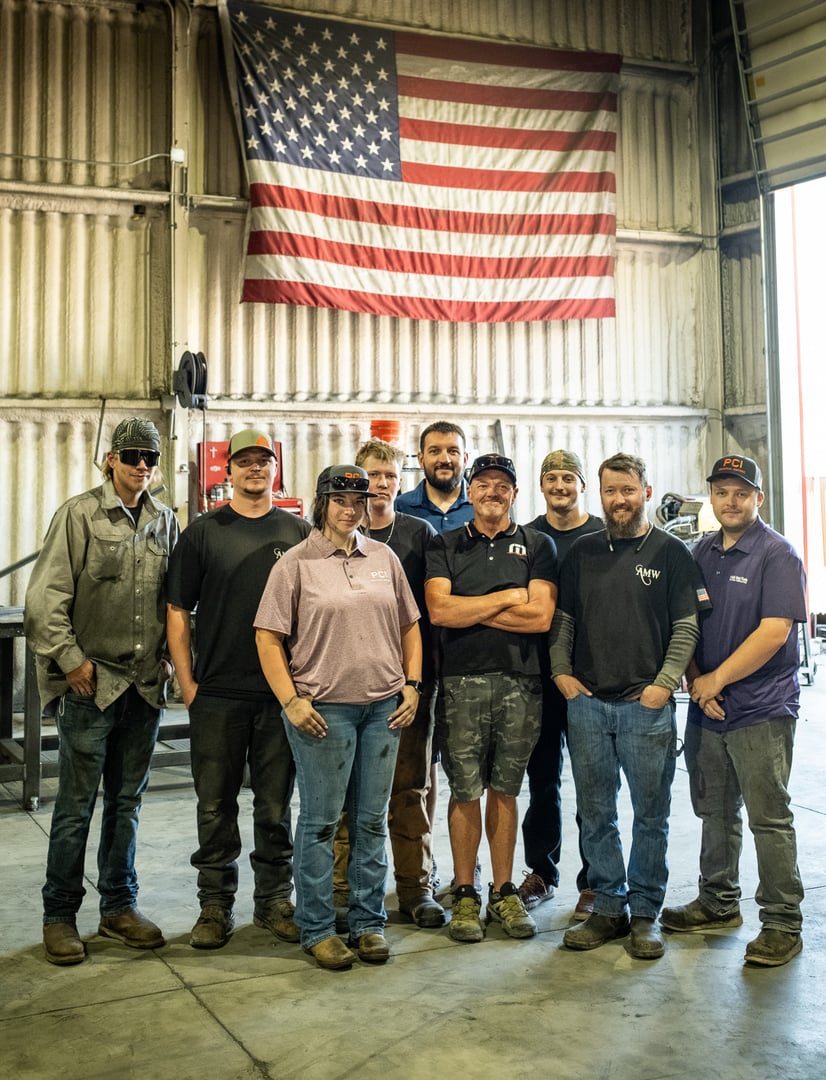 Premier Coatings team member working on powder coating process