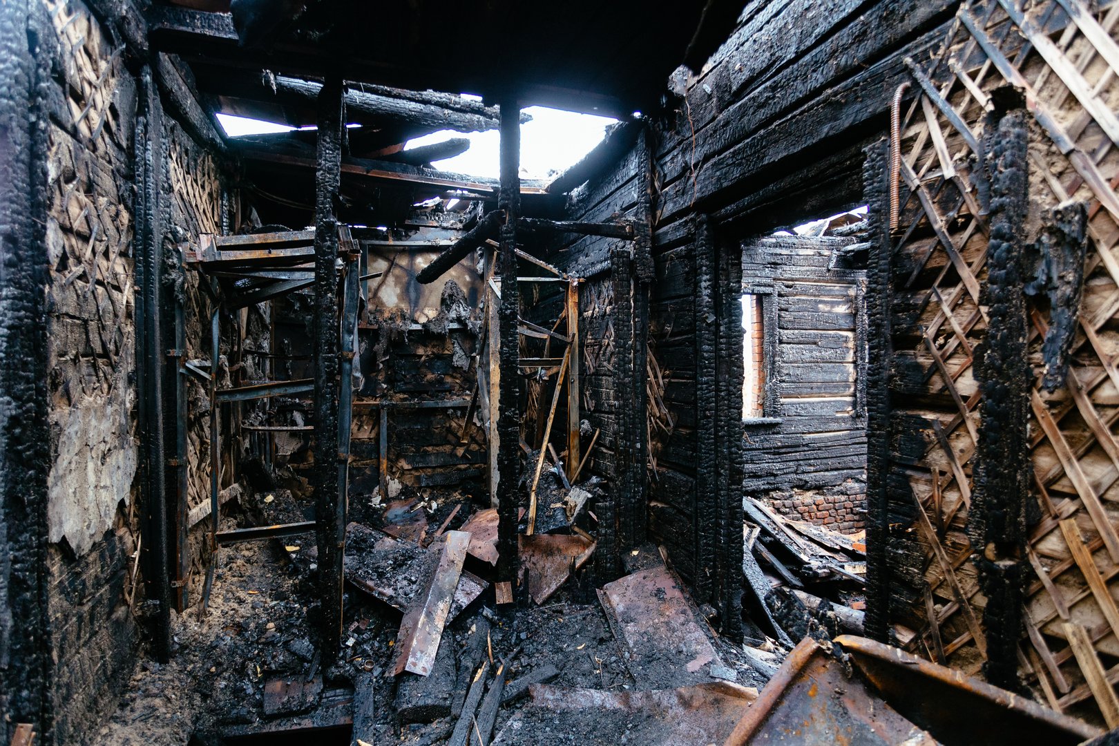 Burnt house interior. Fire aftermath.