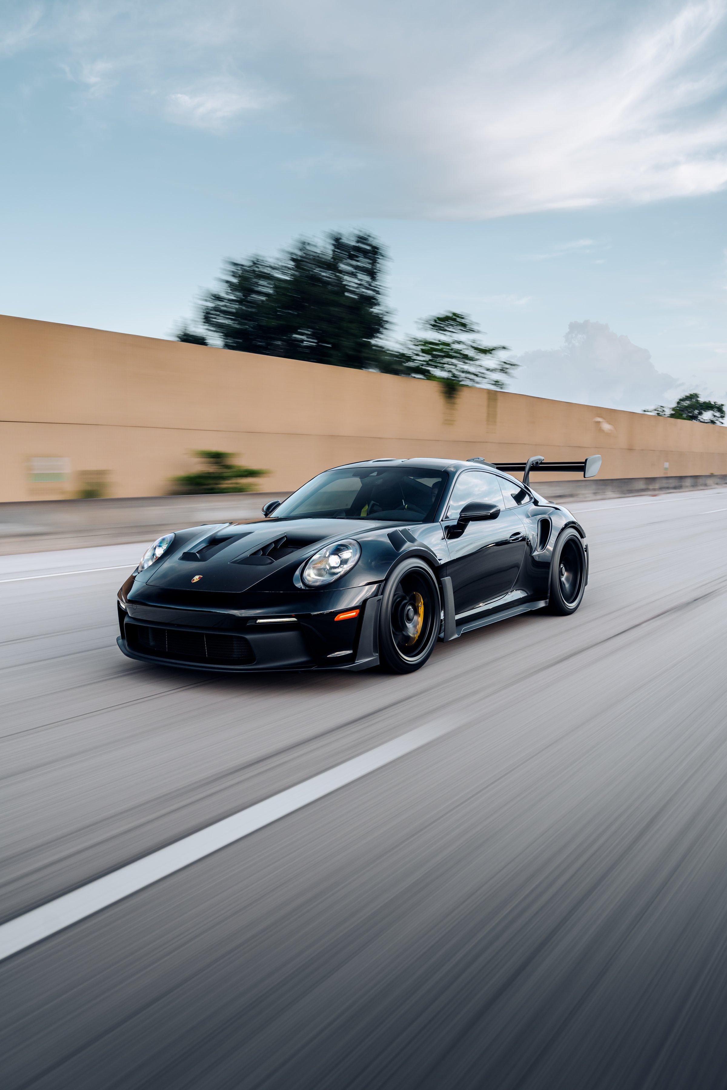Miami, FL, USA June 10, 2025 Porsche 911 GT3RS driving on the street