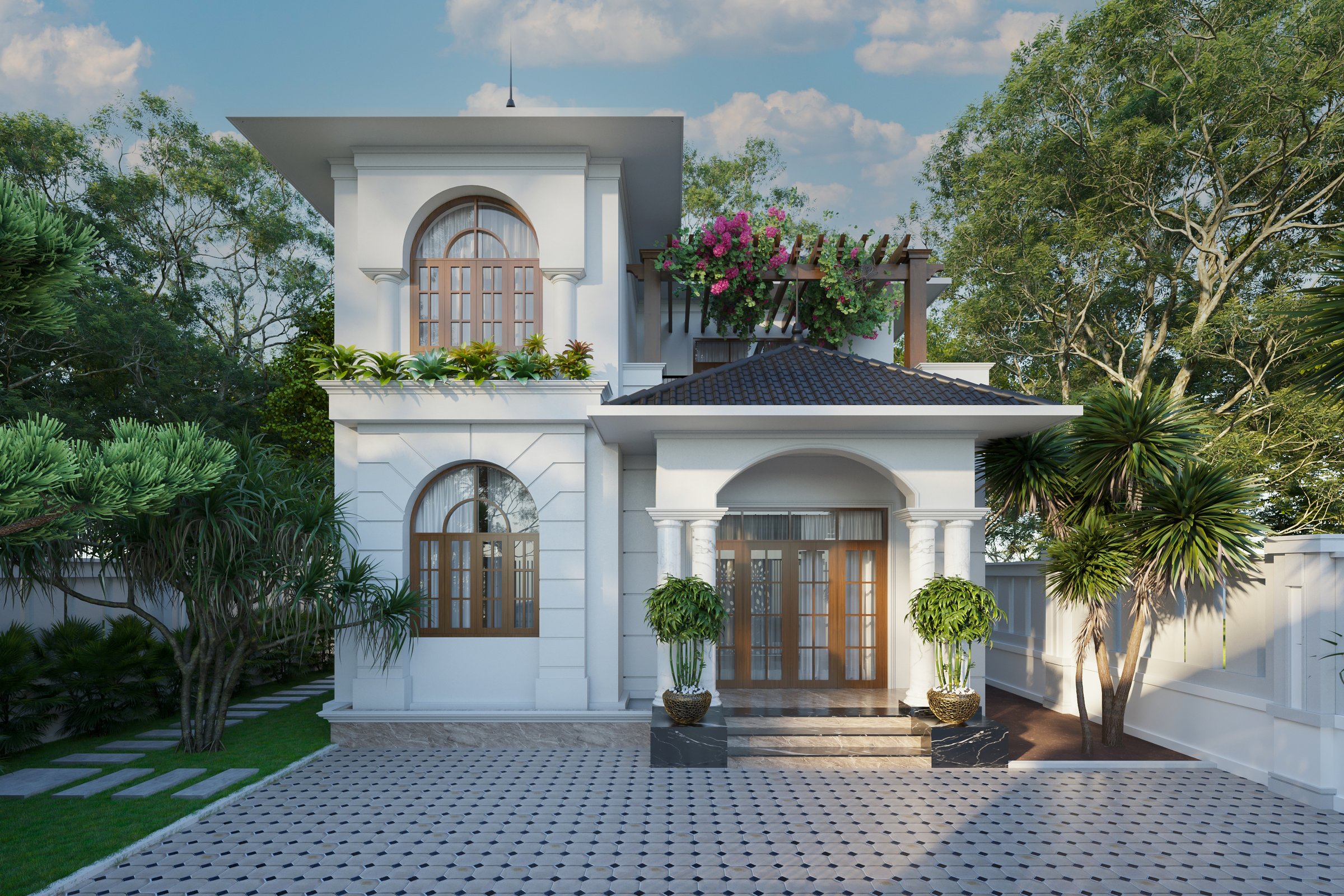a white two-story house with a grey roof. It has a front yard with a garden and a driveway.