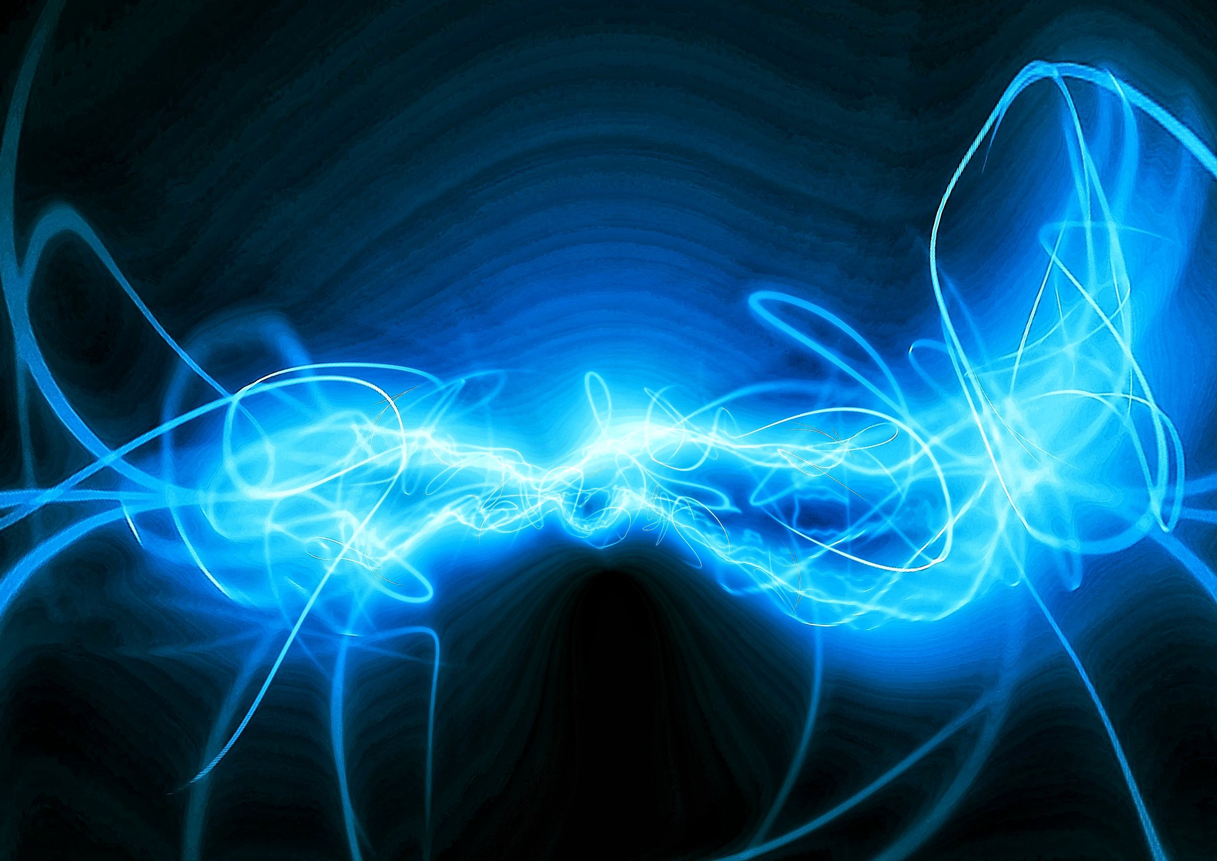 Abstract background of glowing blue light trails forming dynamic energy waves. Futuristic neon motion design representing technology, electricity, and digital power. Perfect for AI, innovation, or science themes.