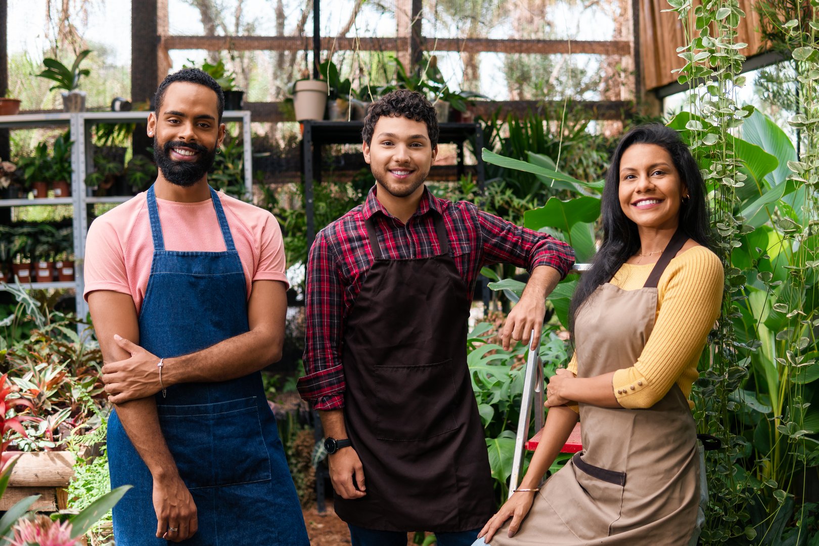 Sales team smiles for portrait in a neighborhood trade