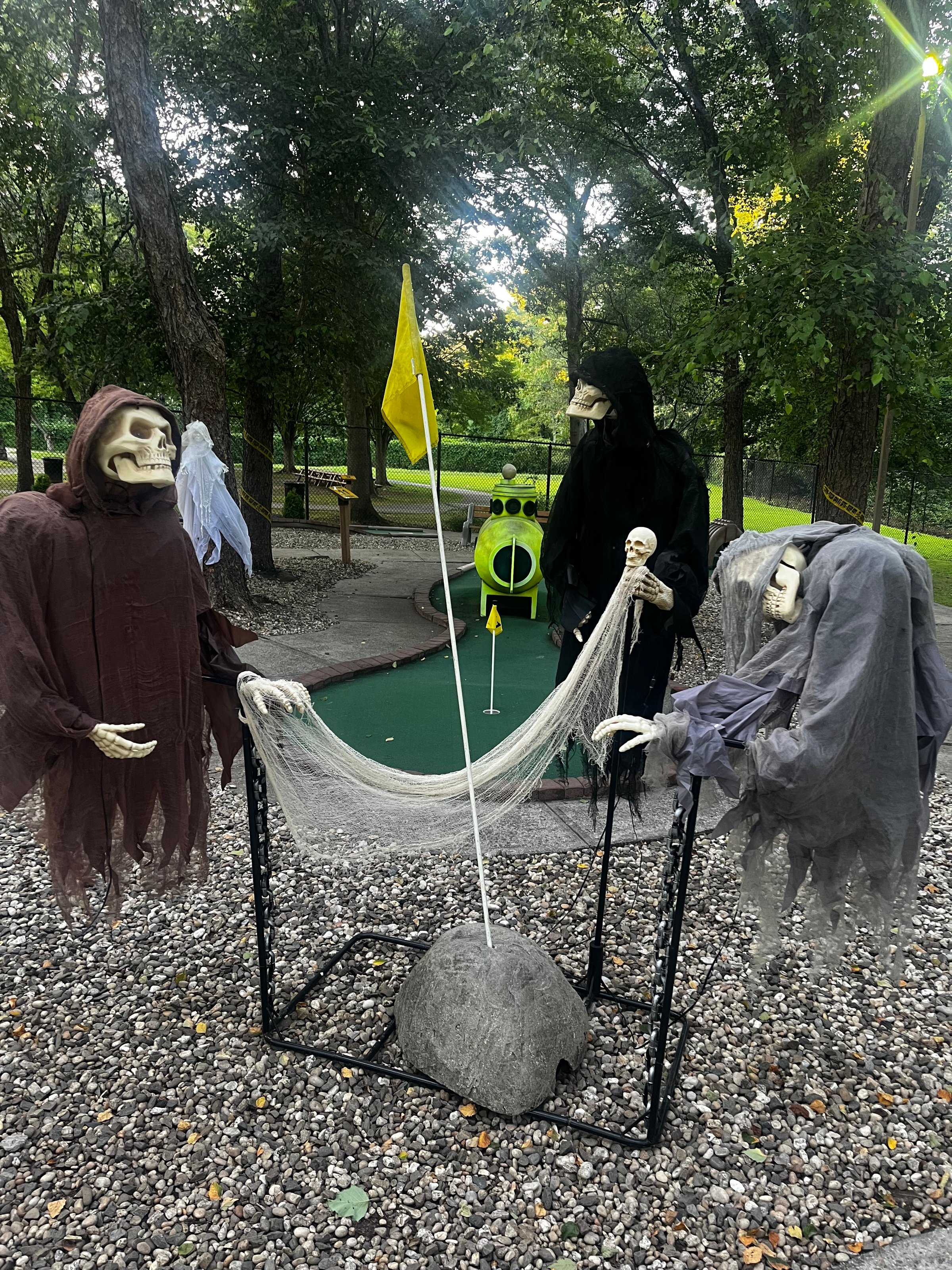 Spooky Halloween setup at Saxon Woods Mini Golf with festive decorations