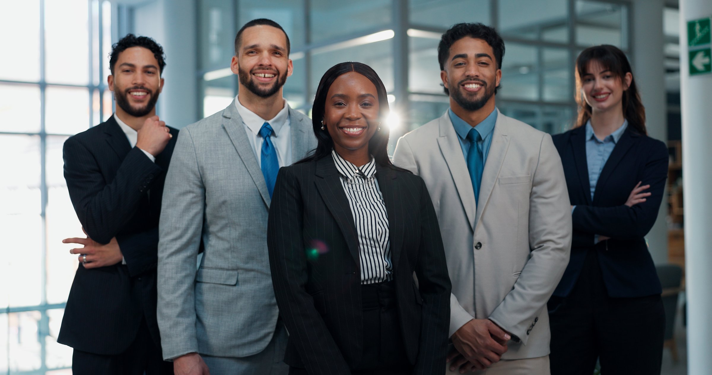 Business, people and group in portrait at law firm for corporate justice, about us or career pride. Diversity, lawyer team and happy for legal internship, professional growth and skills development