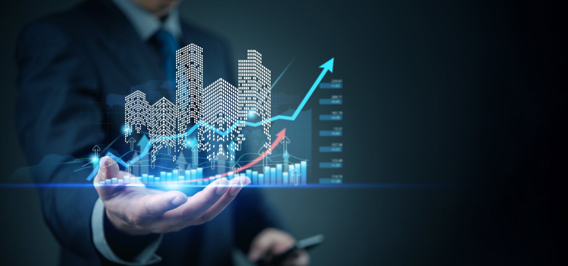 Business hand showing futuristic skyline with finance graph, smart city concept, economic growth, investment planning, real estate tech, digital economy, data trend.