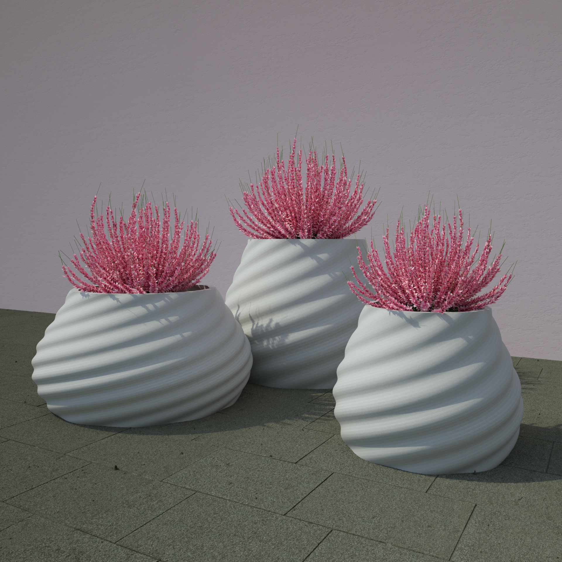 Three large, white, spiral-fluted planters with pink flowering plants, set against a light purple wall on a tiled floor.